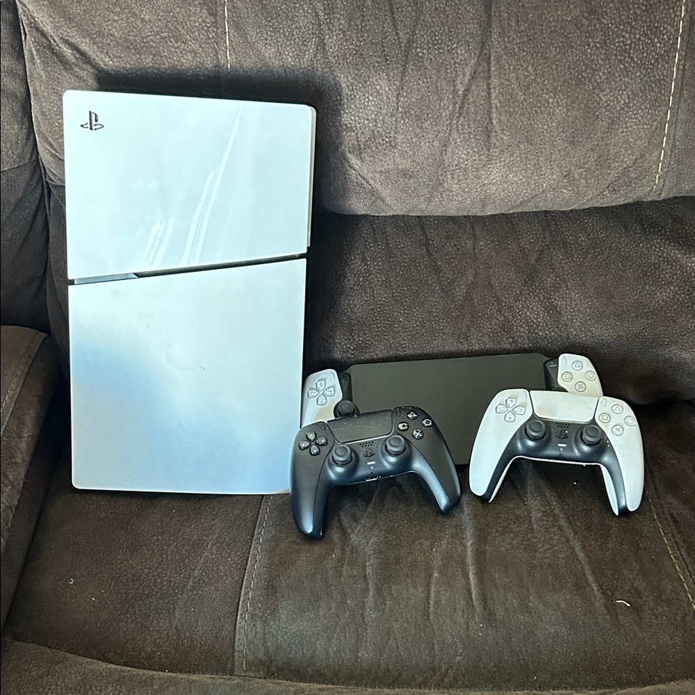Sony PlayStation Console with Dual Controllers - White and Black